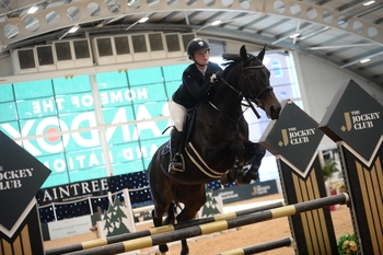Alana Hood books her place at the Royal International with victory in the SEIB Winter Novice at Aintree Equestrian Centre